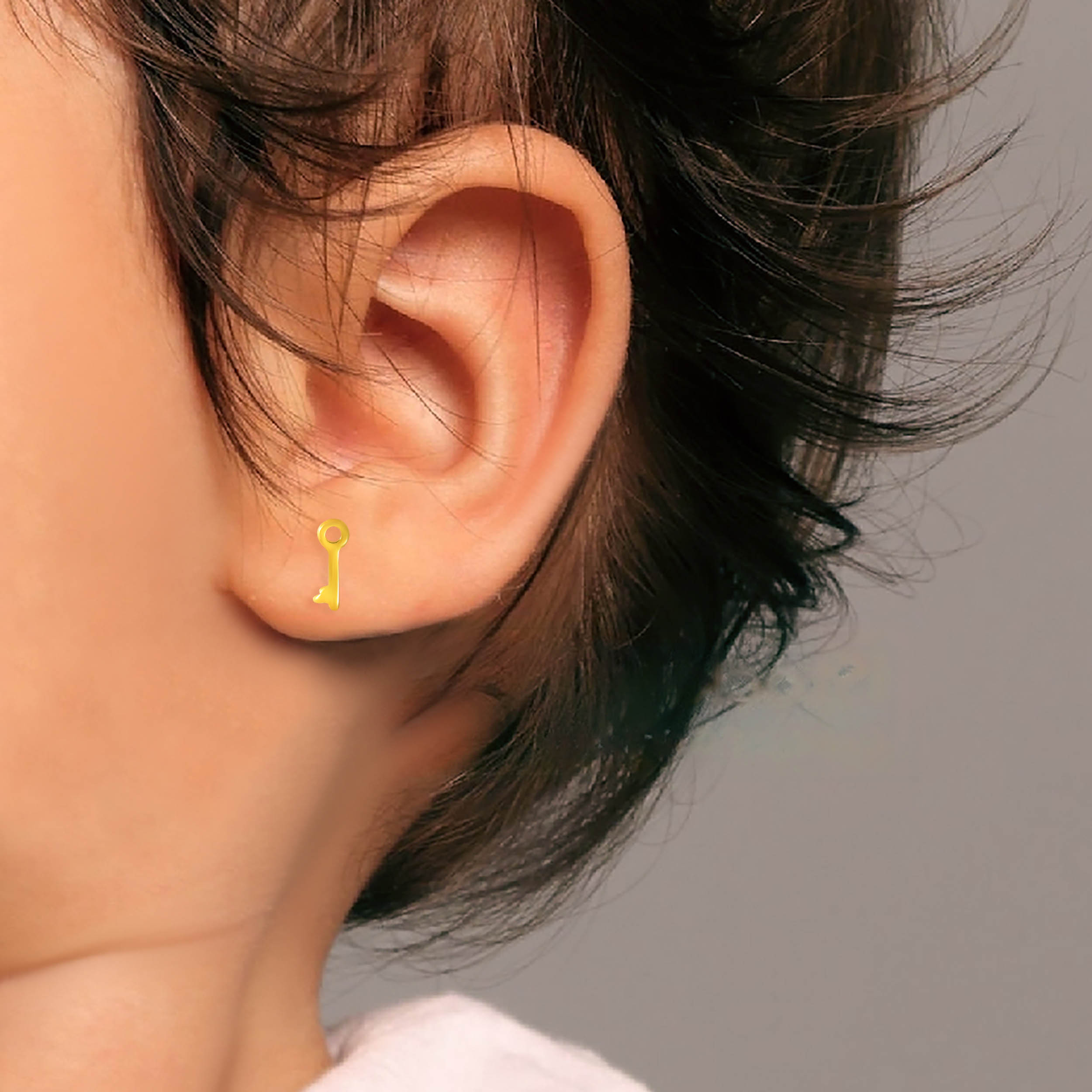 Key to Innocence Gold Studs - Senco Gold and Diamonds