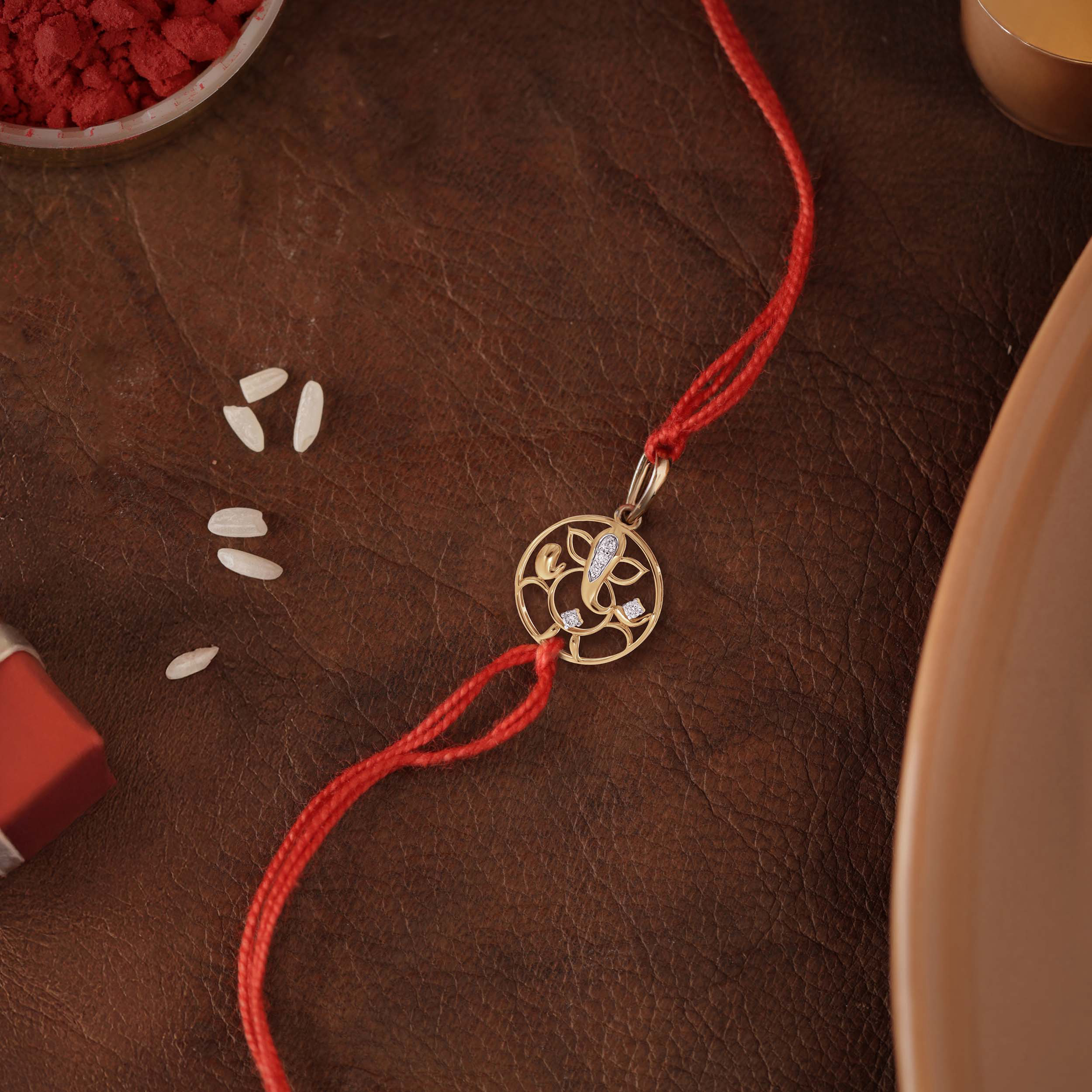 Radiant Ganesha Diamond Rakhi Pendant - Senco Gold and Diamonds