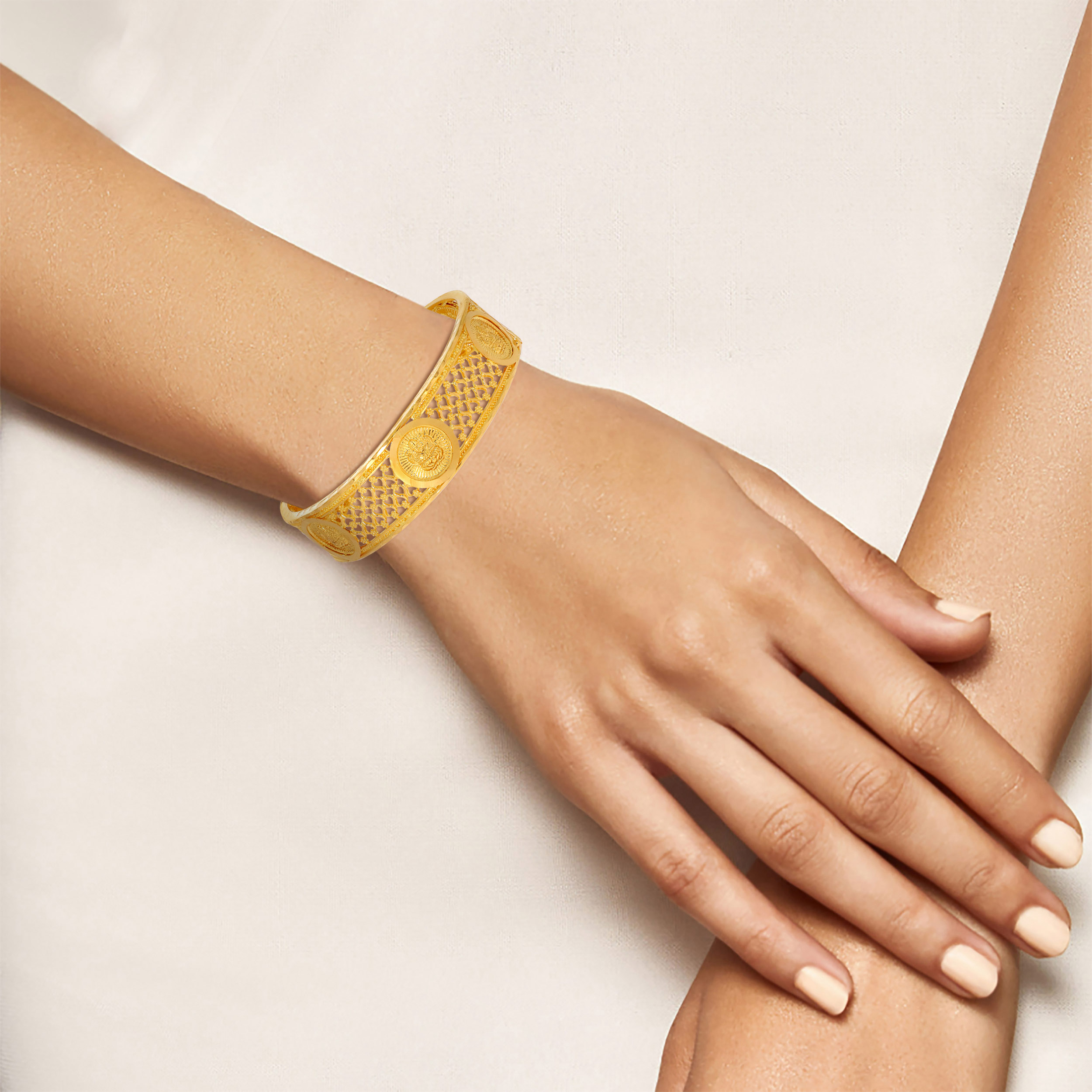 Blessed Ganesha Gold Chur Bangle - Senco Gold and Diamonds