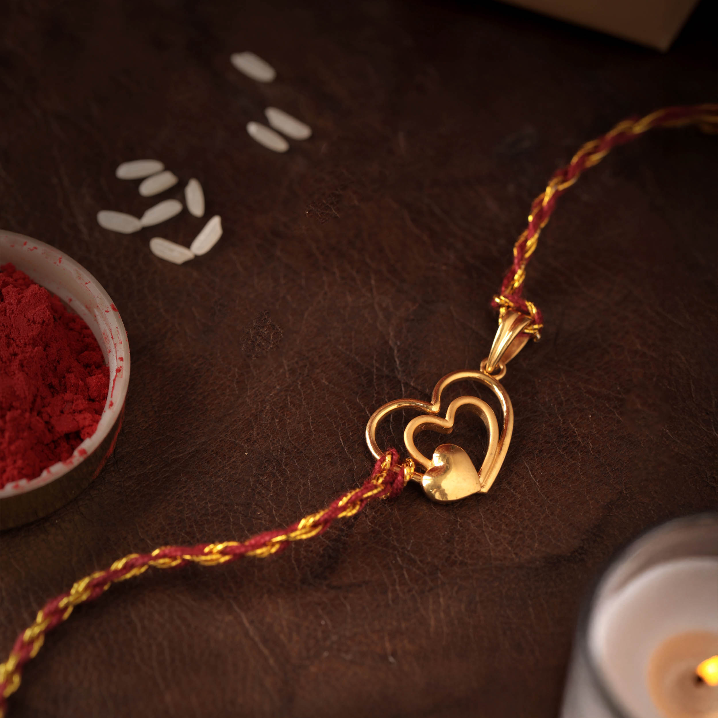 Glow Of Affection Gold Rakhi Pendant - Senco Gold and Diamonds