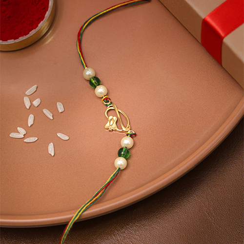 Infinity-Inspired Gold Rakhi - Senco Gold and Diamonds