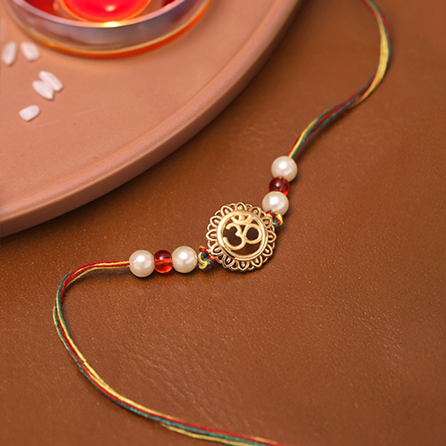 Traditional Vibes Om Gold Rakhi - Senco Gold and Diamonds