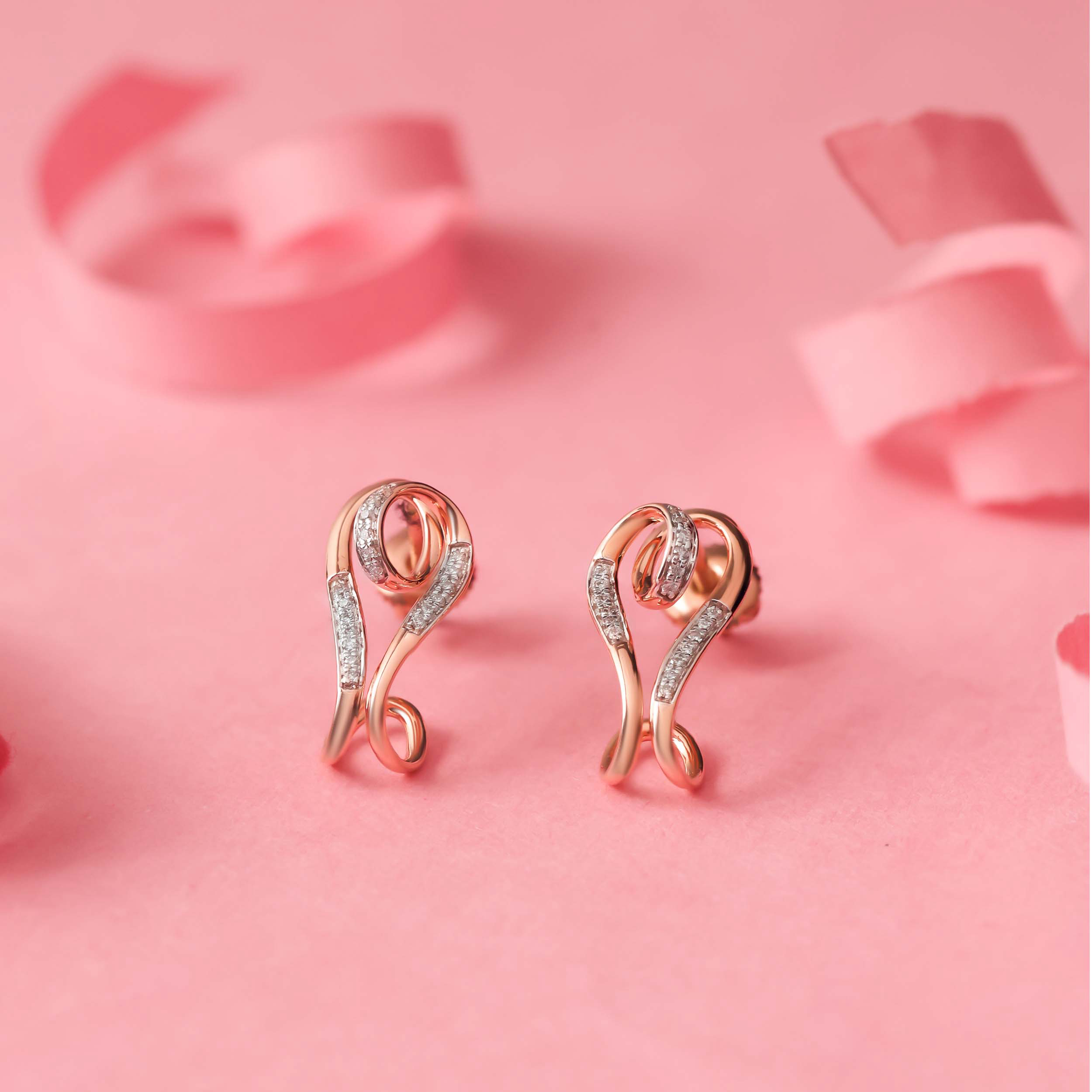 Adorable Spin Diamond Studs - Senco Gold and Diamonds